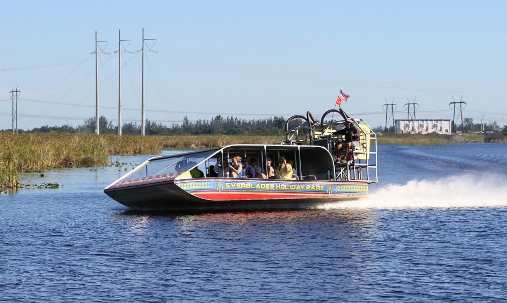 airboat tour turning on an everglades canal