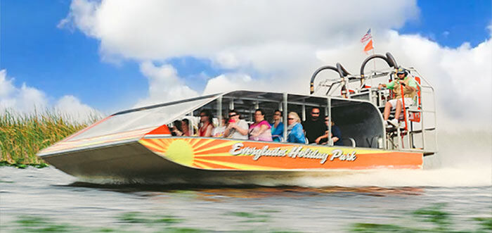 image of airboat speeding along everglades